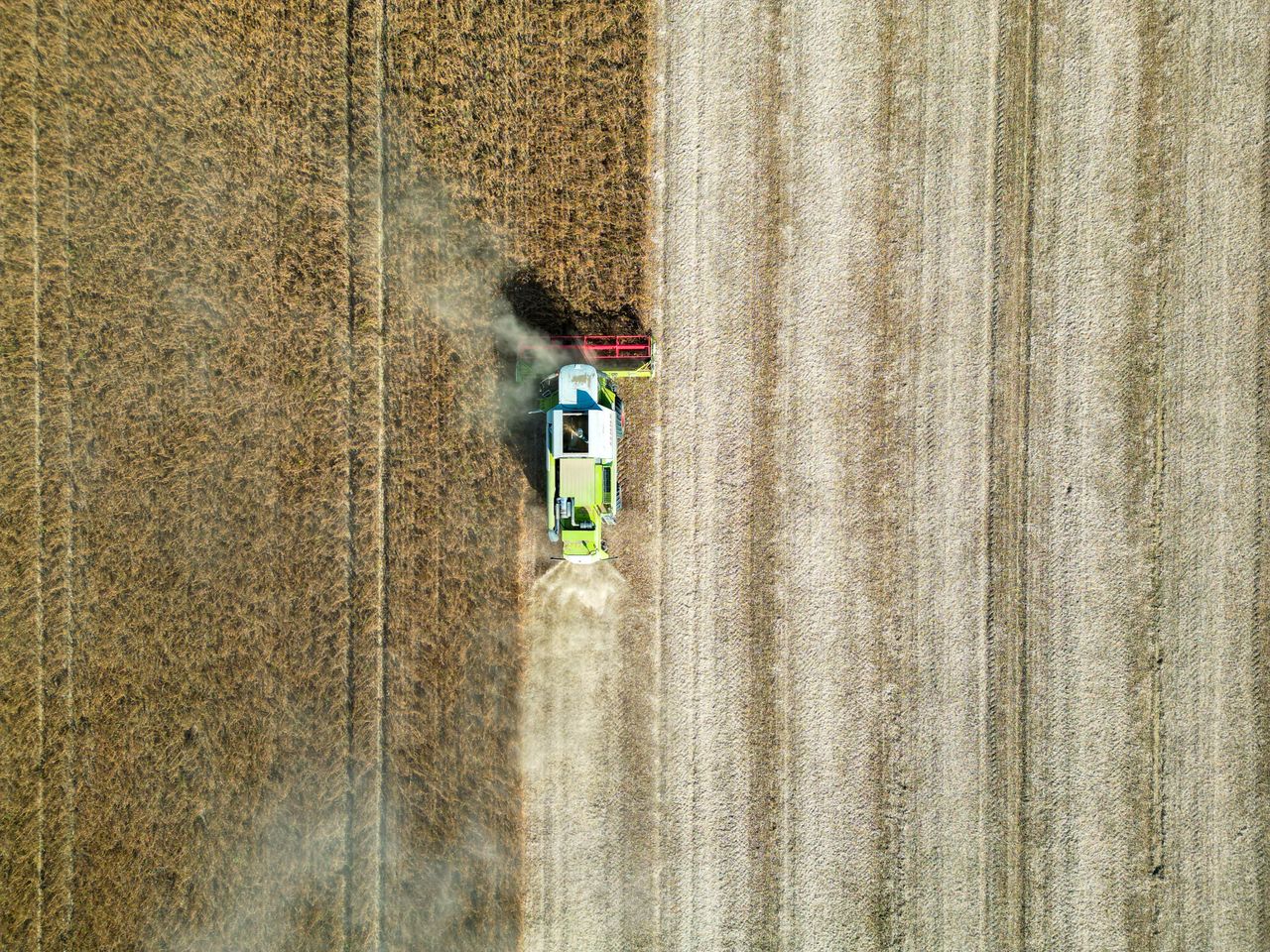 Drone shot of a combine harvester working in a wheat field in Garešnica, Croatia.